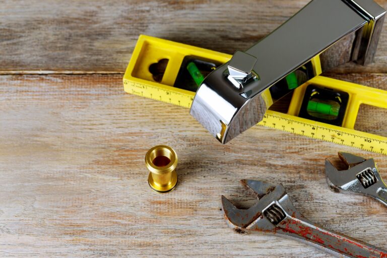 plumbing and tools lying on drawing for repair Plumbing Tools Arranged